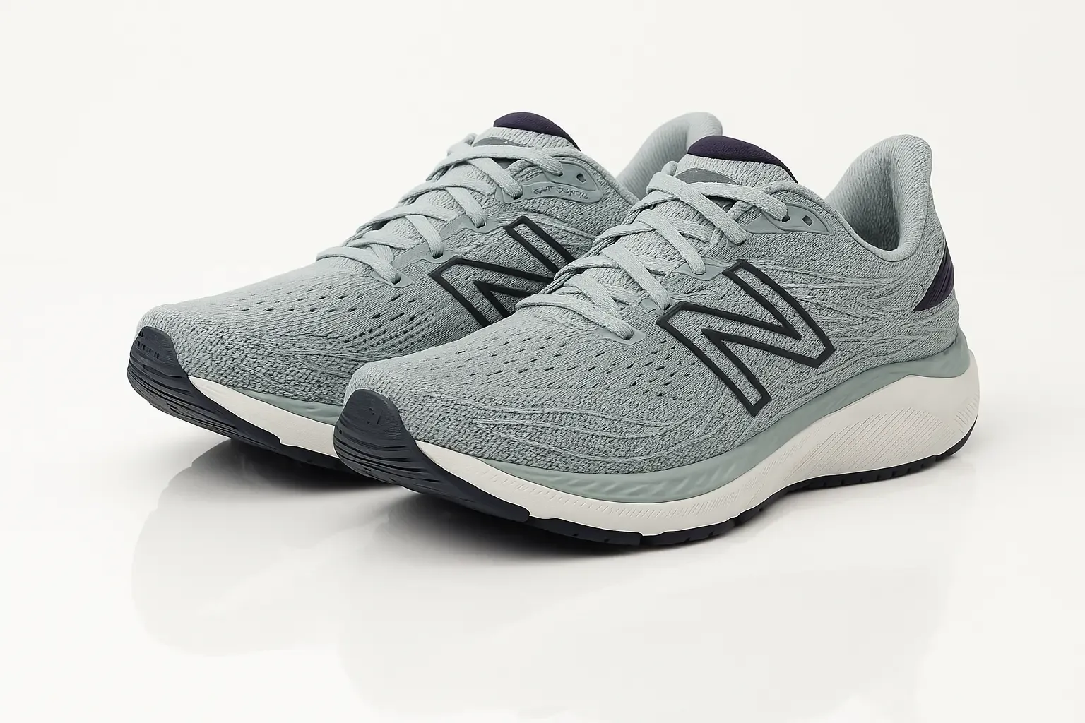 New Balance X860v12 light blue/mint running shoes with navy accents