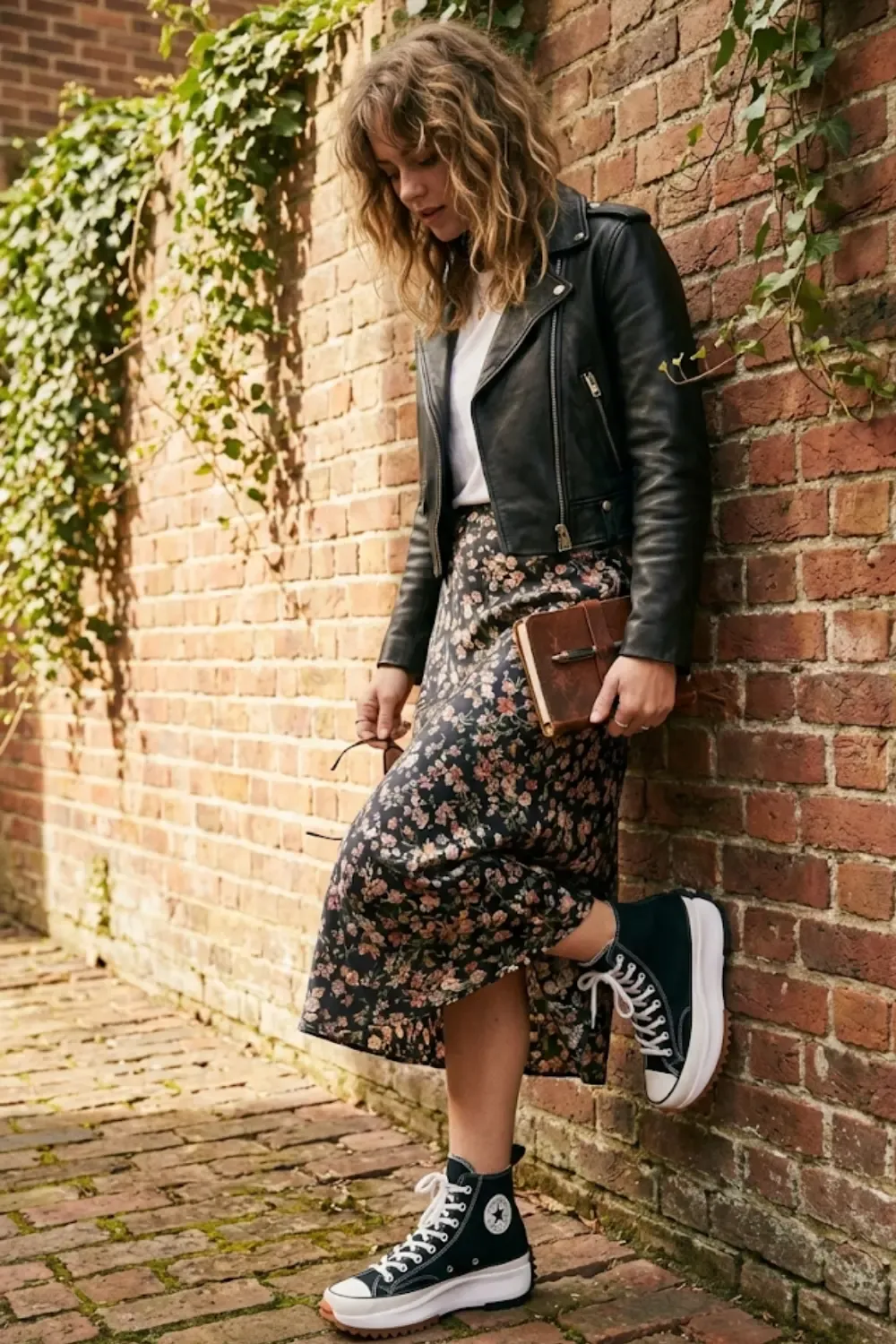 A fashion-forward woman mixing 'Grungy' and 'Feminine' elements with Converse Run Star Hike